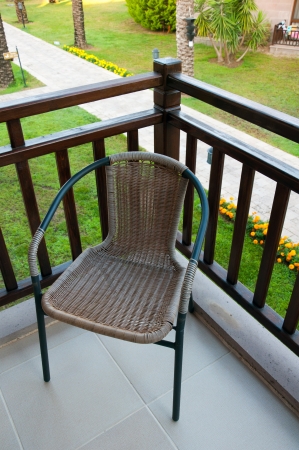 Wicker chair on the balconyの写真素材
