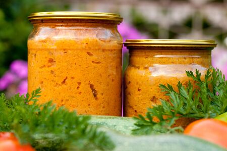 canned vegetables zucchini in a glass jarの写真素材