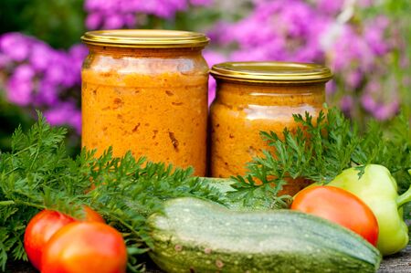 canned vegetables zucchini in a glass jarの写真素材