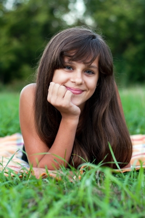 Brunette teen girl on natureの写真素材