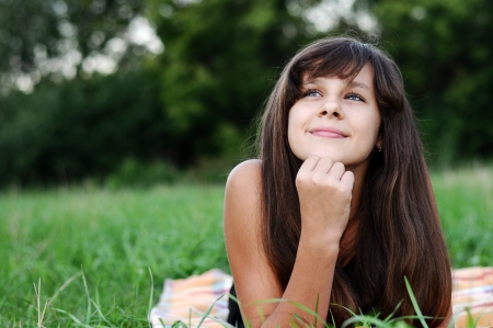 Brunette teen girl on natureの写真素材