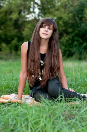 Brunette teen girl on natureの写真素材