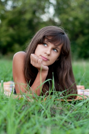 Brunette teen girl on natureの写真素材