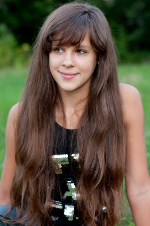 Brunette teen girl on natureの写真素材