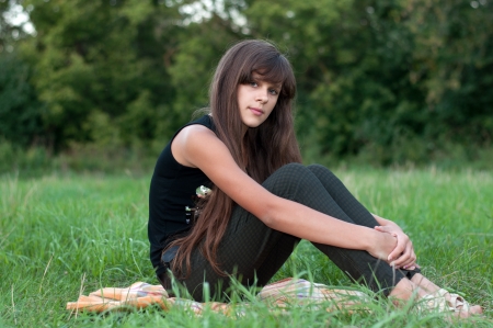 Brunette teen girl on natureの写真素材