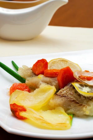 Cod baked with vegetablesの写真素材