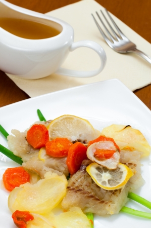 Cod baked with vegetablesの写真素材