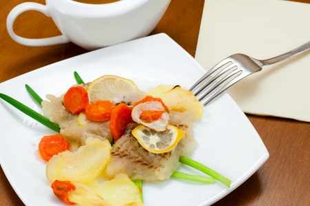 Cod baked with vegetablesの写真素材