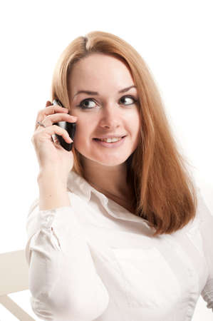 Portrait of a woman talking on a mobile phoneの写真素材
