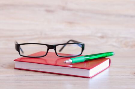 Business still life with diary and glassesの写真素材