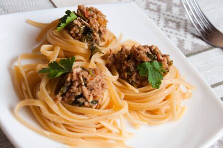 Italian pasta with beef in tomato sauceの写真素材
