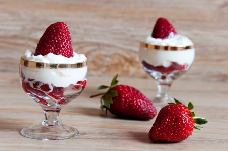 A delicious dessert of strawberries with creamの写真素材