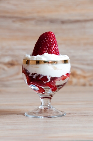 A delicious dessert of strawberries with creamの写真素材