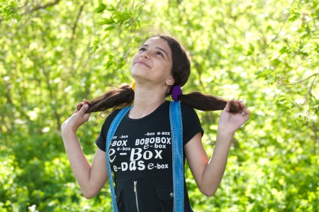 Portrait of a teen girl on natureの写真素材