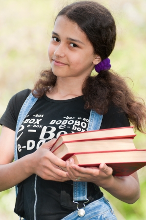 Teen girl with booksの写真素材