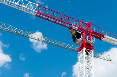 Construction crane against the skyの写真素材