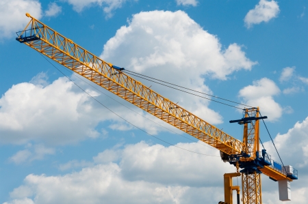 Construction crane against the skyの写真素材