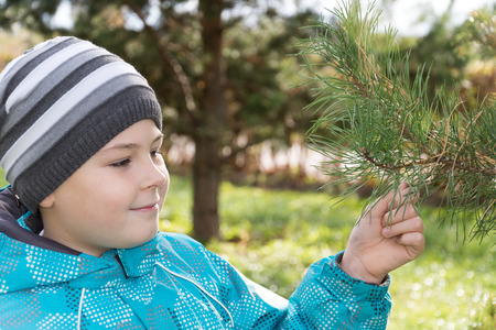 A boy in a pine parkの写真素材