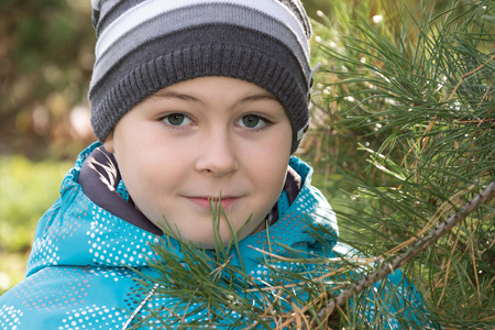 A boy in a pine parkの写真素材
