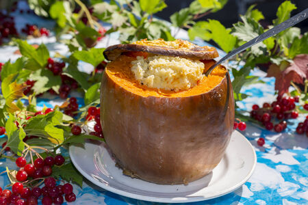Dairy millet porridge baked in a pumpkinの写真素材