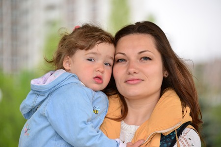 Mom and daughter 2.5 years for a walk in the gazebo