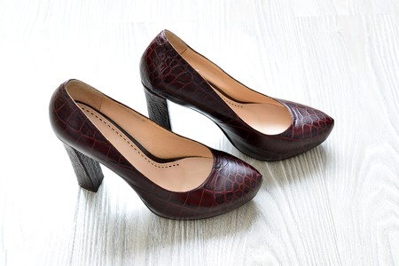 A Beautiful woman shoes on the floorの写真素材