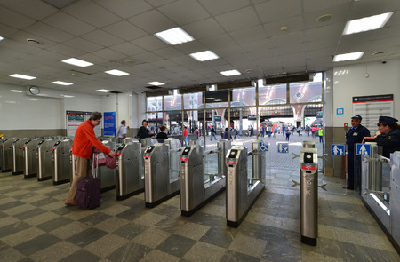 MOSCOW, RUSSIA - 17.06.2015. Turnstiles at the entrance to the commuter train at Kursk station