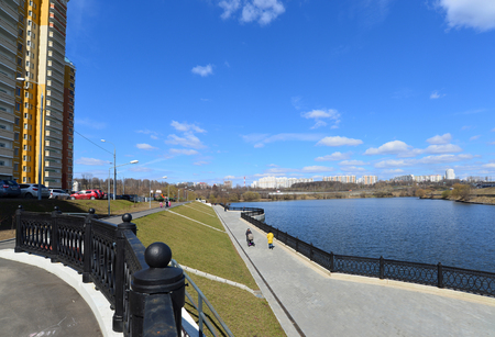 Krasnogorsk RUSSIA - 15.05.2015. The picturesque embankment on the Moscow River - a place of mass walks in Moscow suburbsのeditorial素材