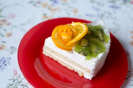 A piece of cake with yogurt and fruitの写真素材