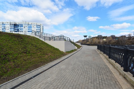 Krasnogorsk RUSSIA - April 22.2015: The Zivopisnaya promenade on the banks of the Moskva River. Location walking people. Area residential development is about 2 million square feetのeditorial素材