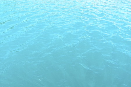 The water of the Mediterranean Sea on a bright dayの写真素材