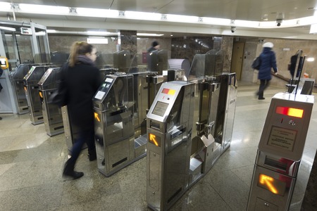 Nizhny Novgorod, RUSSIA - 02.11.2015. People go through Turnstiles at the Gorkovskaya metro station.のeditorial素材