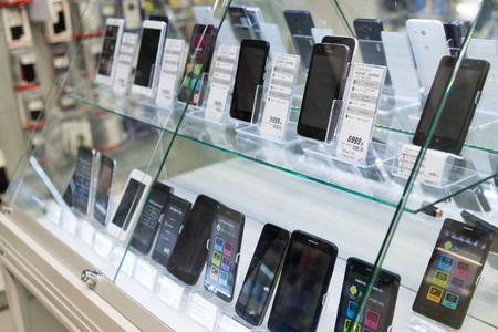 Moscow, Russia - February 02. 2016. Smartphones in storefront in Eldorado is large chain stores selling electronicsのeditorial素材