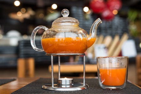 Sea Buckthorn tea candle basking in a Japanese restaurantの写真素材