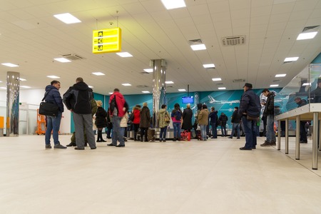 Volgograd, Russia - October 31.2016. Passengers await the luggage around the baggage carousel in C terminalan of Aeroportのeditorial素材