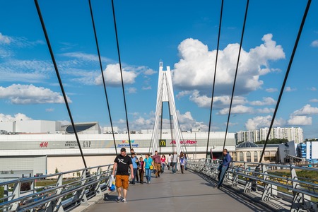 Krasnogorsk, Russia - July 09.2016 People go on the cable-stayed pedestrian bridge.のeditorial素材
