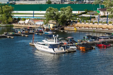 Moscow, Russia - July 09.2016. Pleasure boats at the pier of the yacht club Shore Houseのeditorial素材