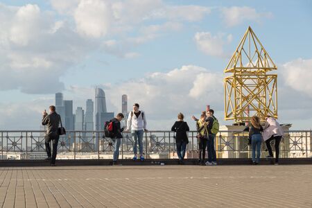 Moscow, Russia - October 1. 2016. People on observation deck on background of skyscrapers of Moscow Cityのeditorial素材