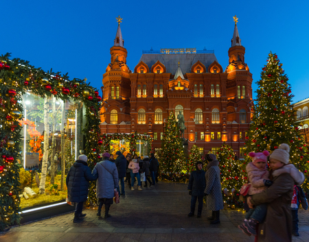 Moscow, Russia - January 10. 2018. Christmas trees on the background of historical museum on Manezhnaya Squareのeditorial素材