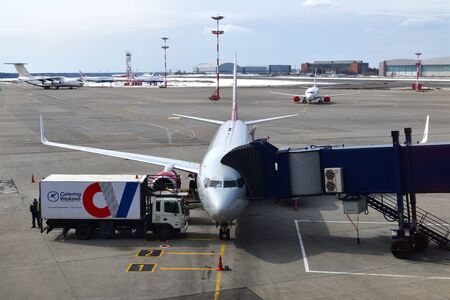 Moscow, Russia - April 4. 2018. loading of food into plane of airline Rossiya at Vnukovo airport