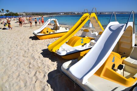 Ayia Napa, Cyprus - November 1. 2018. Pedal catamarans on Makronissos Beach Resortのeditorial素材