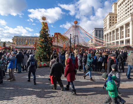 Moscow, Russia - March 9. 2019. people at the Manege Square during the celebration of Shrovetideのeditorial素材