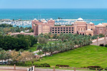 Abu Dhabi, UAE - April 4. 2019. Fragment of the territory Emirates Palace - luxury hotel surrounded by about 85 hectares of lawn and gardensのeditorial素材