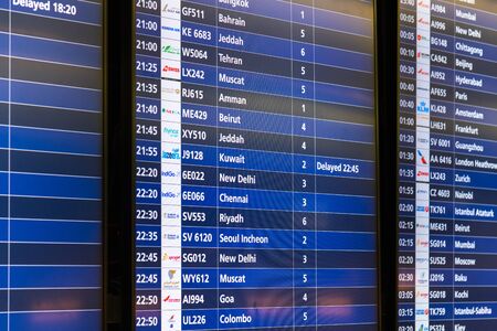 Dubai, UAE - April 2. 2019. Departure Scoreboard it DXB international airport