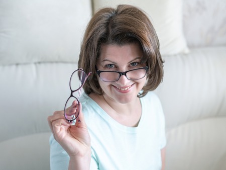 The Woman with two glasses in home interior