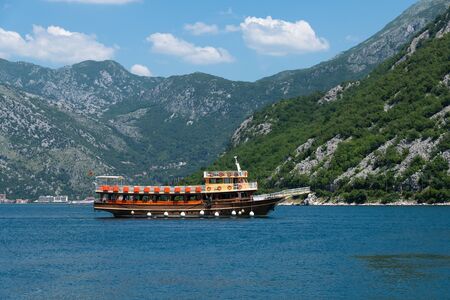 Perast, Montenegro - June 10. 2019. Beautiful excursion boat in Boka-Kotorska bay