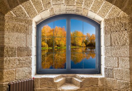 Fragment of a stone wall with a window