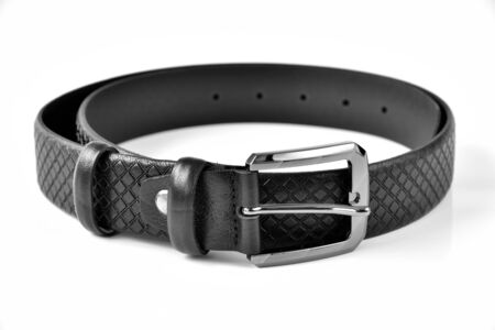 Thin black rolled belt on white background