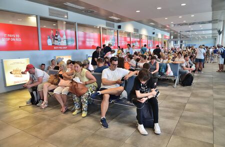 Tivat, Montenegro - Oct 10. 2019. Crowded Departure hall of an international airport Tivat