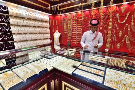 Doha, Qatar - Nov 21. 2019. Gold souq - large store selling very expensive gold jewelryのeditorial素材